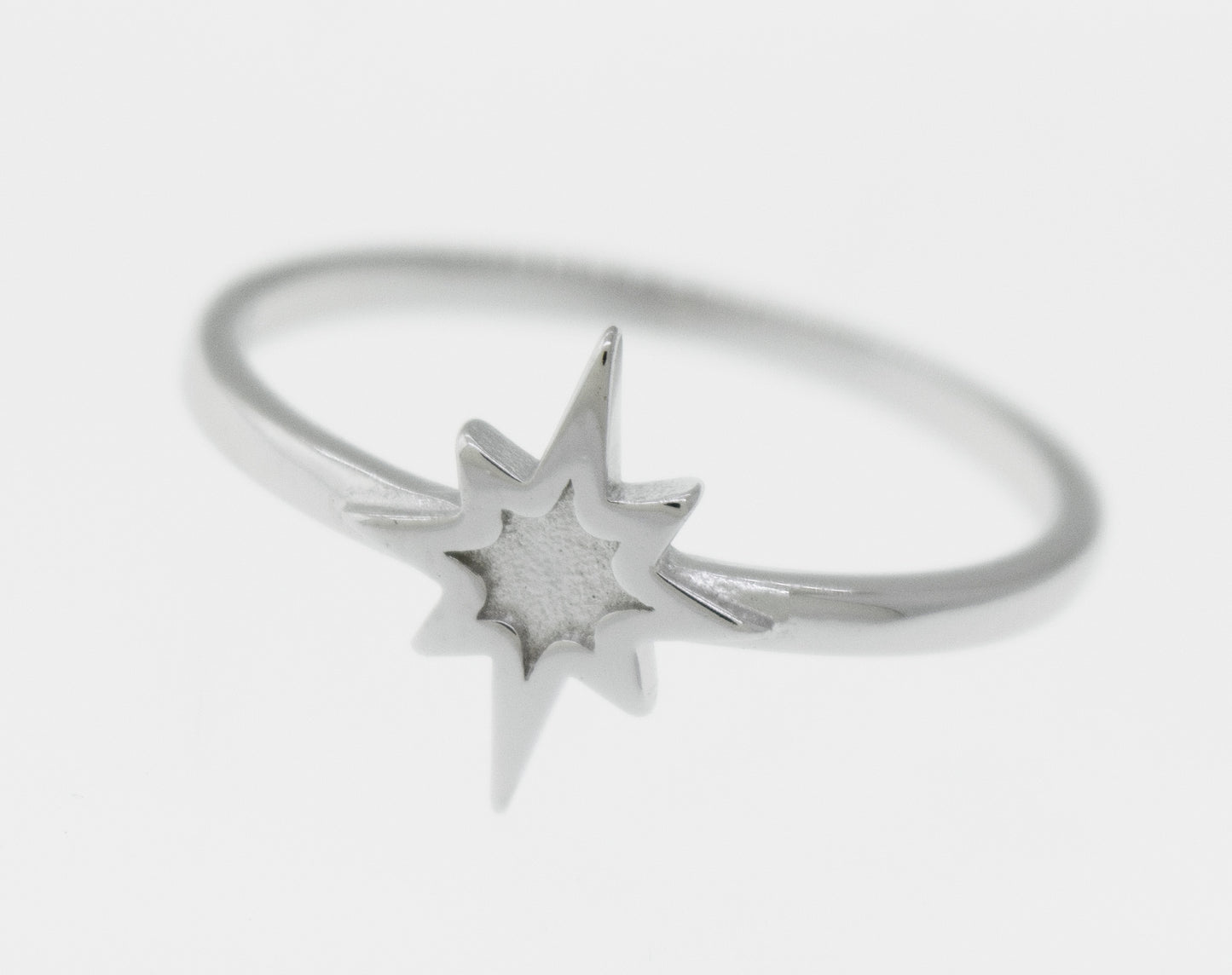 
                  
                    A high polish Super Silver 925 sterling silver Twinkle Star Ring with a twinkle star in the middle.
                  
                