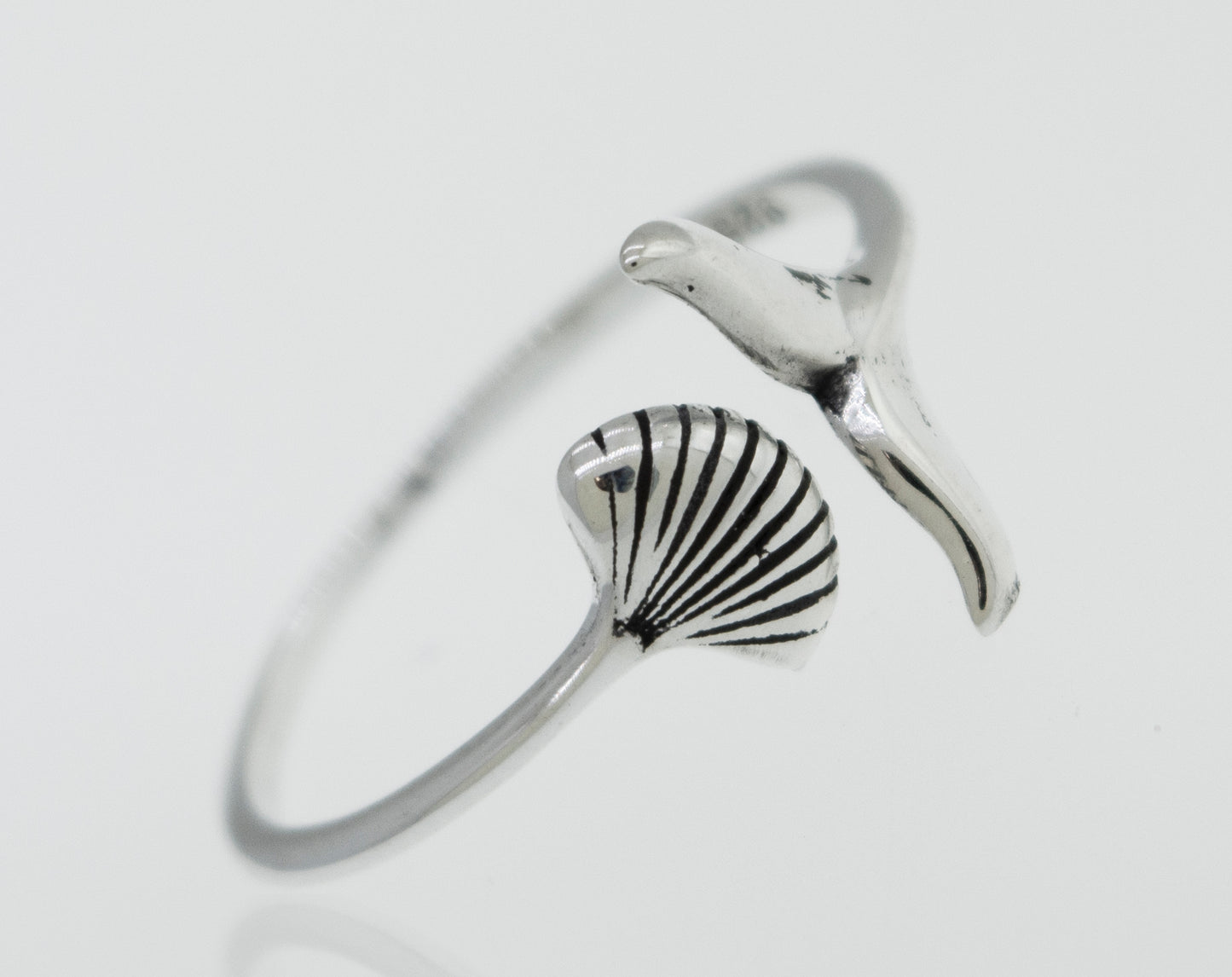 
                  
                    Shark Tail and Seashell Ring
                  
                