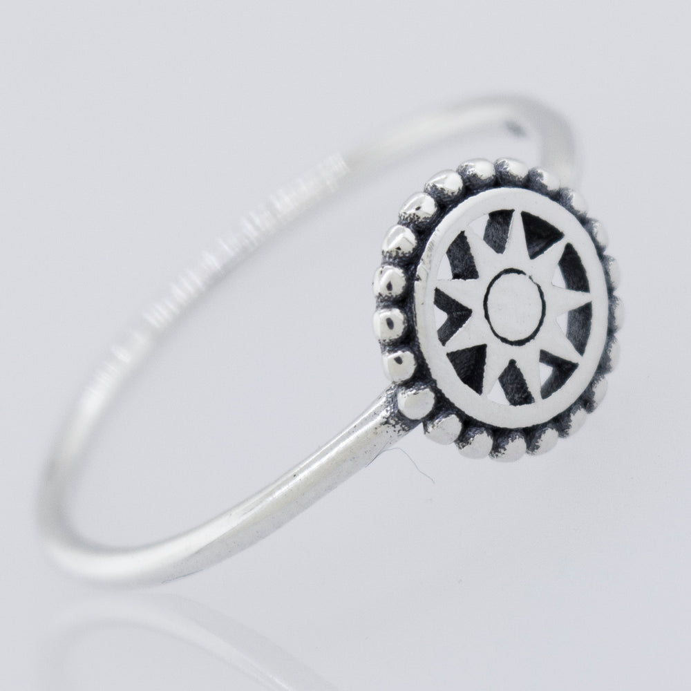 
                  
                    A high polish 925 sterling silver Compass Ring by Super Silver featuring a sun wheel design.
                  
                