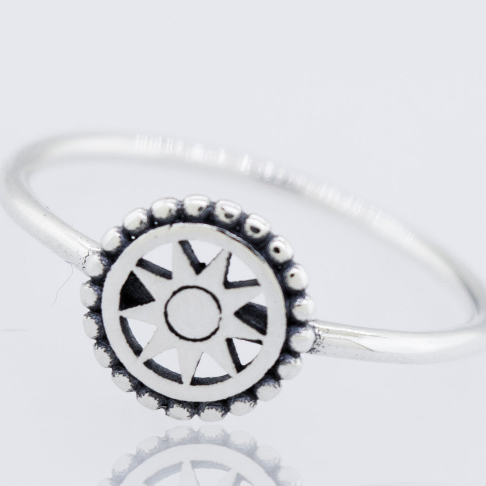 
                  
                    A Compass Ring from Super Silver, made of 925 sterling silver with a high polish and a sun in the center.
                  
                