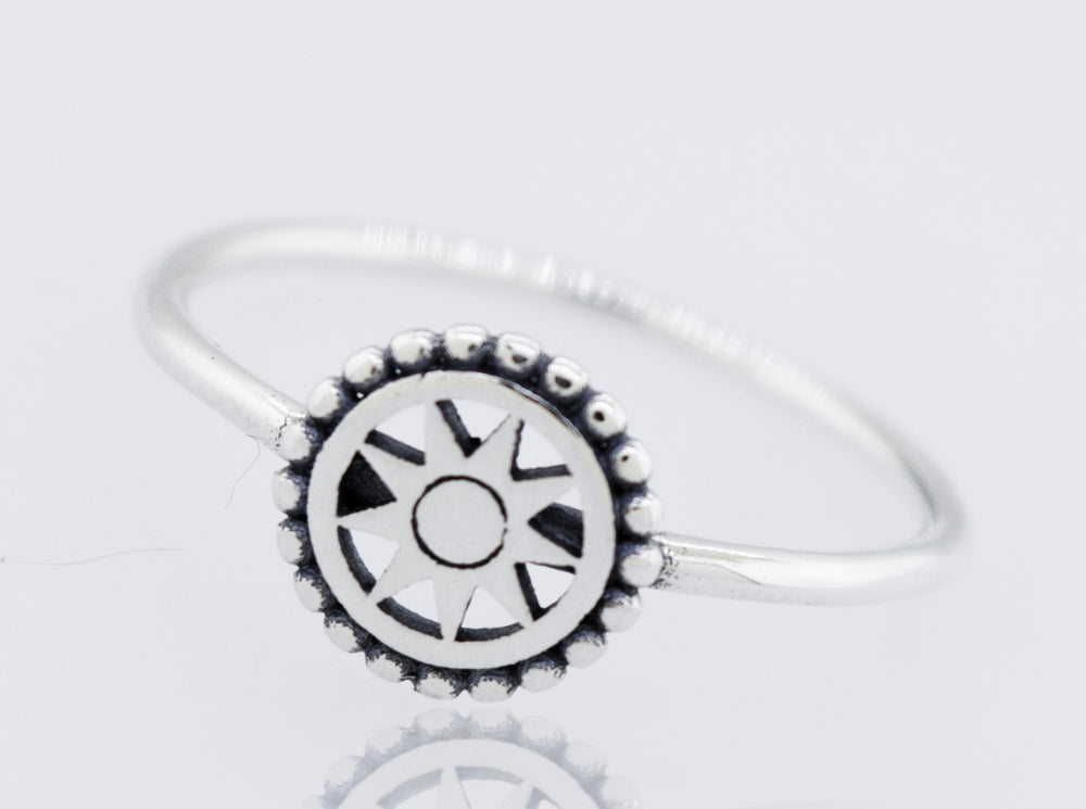 A Compass Ring from Super Silver, made of 925 sterling silver with a high polish and a sun in the center.