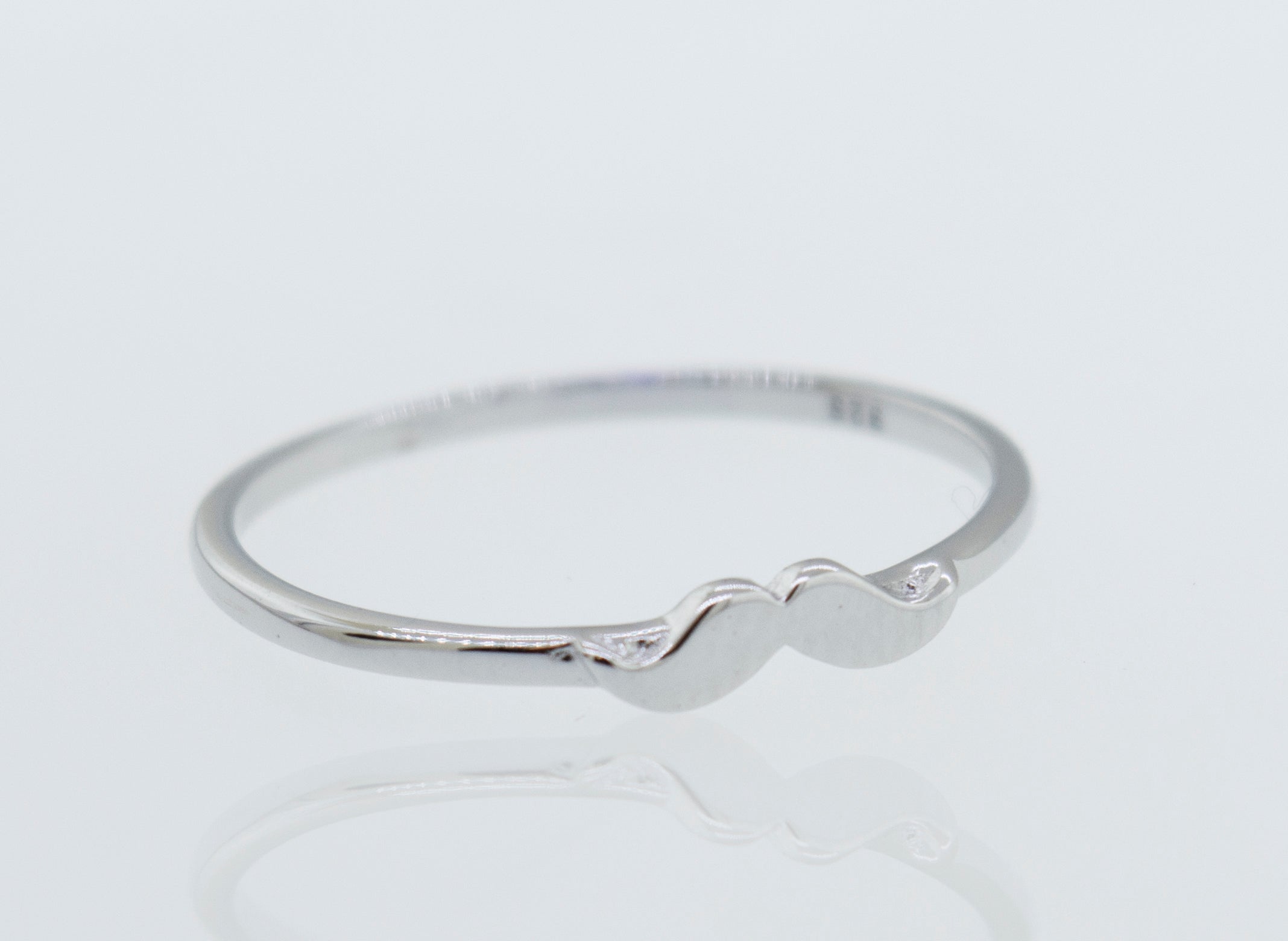 A Super Silver Little Mustache Ring.