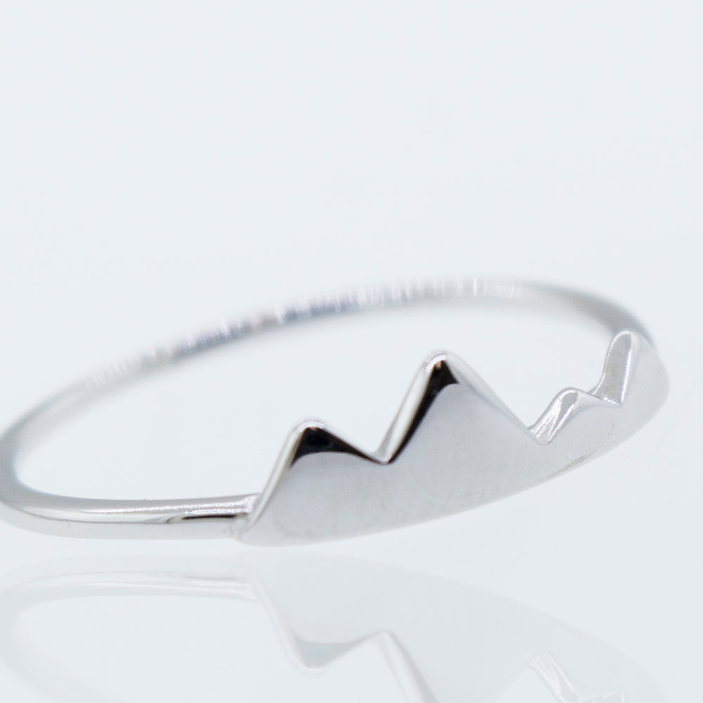 A Super Silver Rhodium Plated Silver Mountains Ring with a mountain design.