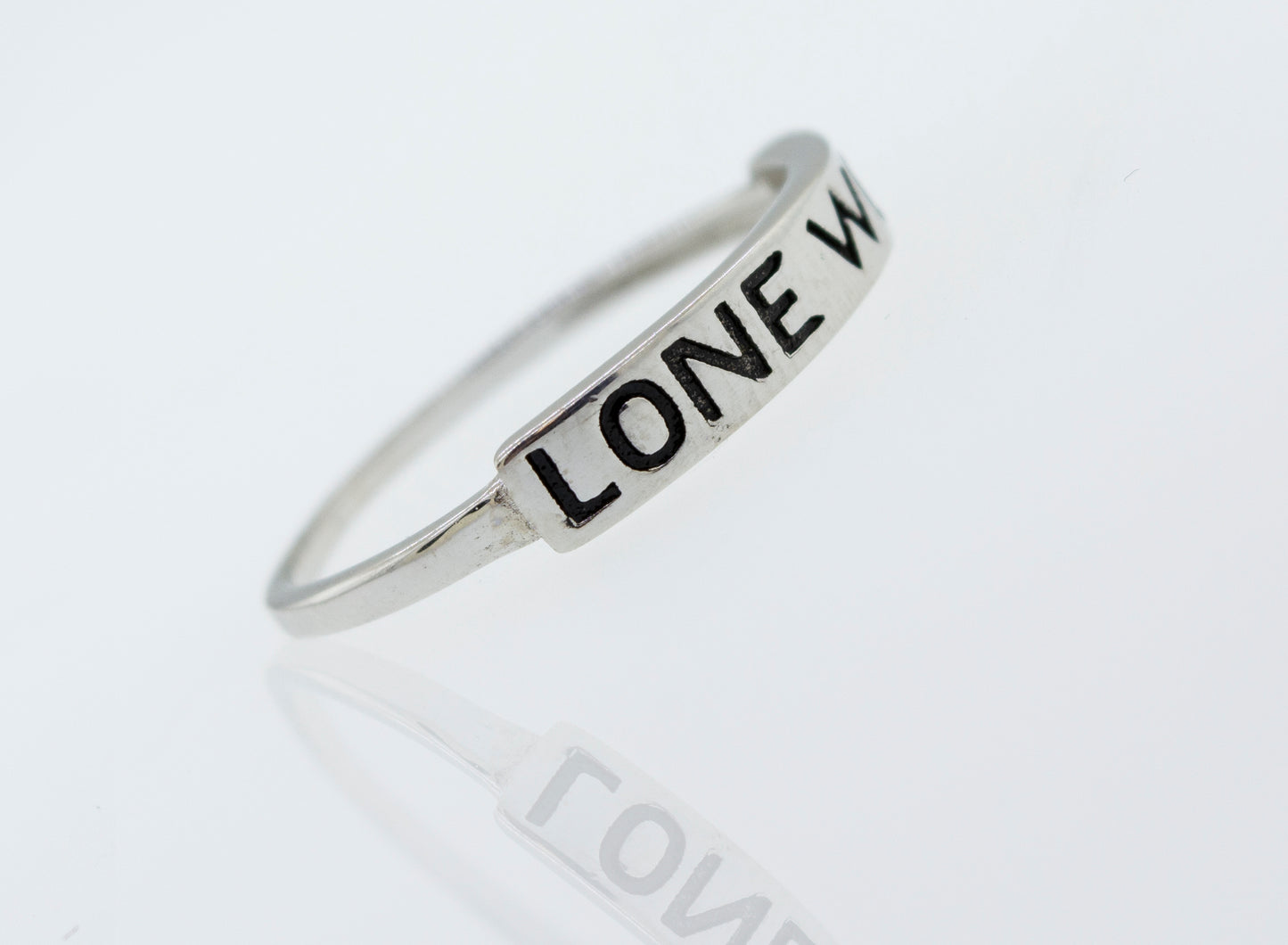
                  
                    A Super Silver sterling silver Lone Wolf ring with the word love written on it.
                  
                