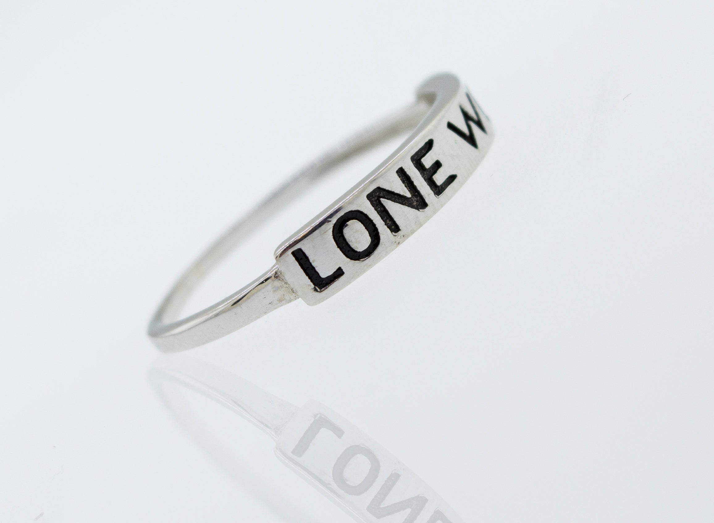 A Super Silver sterling silver Lone Wolf ring with the word love written on it.