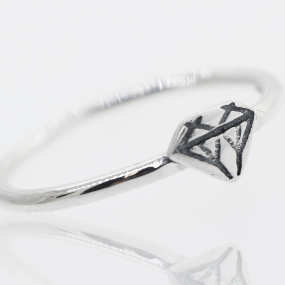 
                  
                    A Super Silver Diamond Shape Ring with a high polish.
                  
                