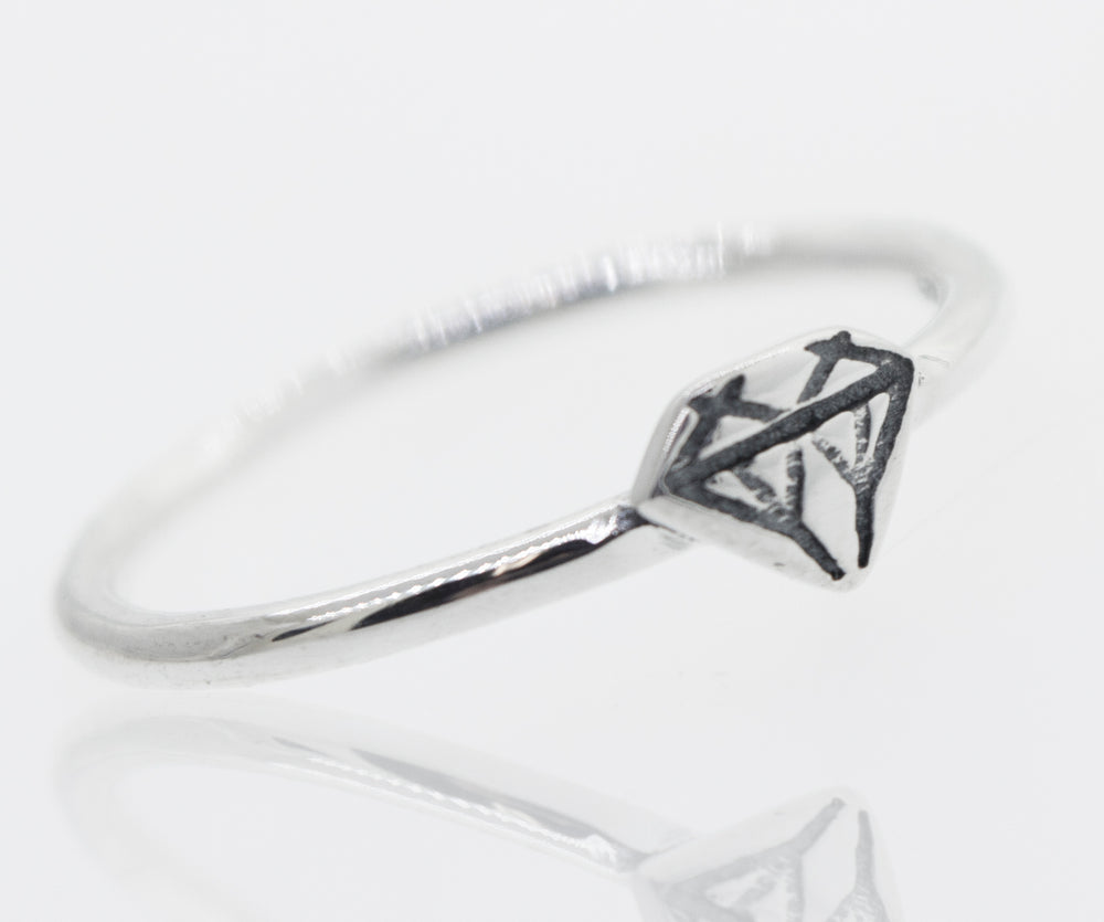 A Super Silver Diamond Shape Ring with a high polish.