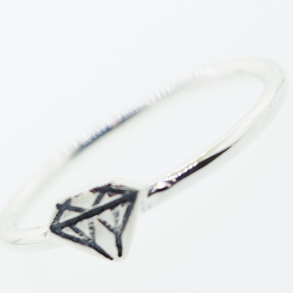 
                  
                    A Super Silver diamond shape ring.
                  
                