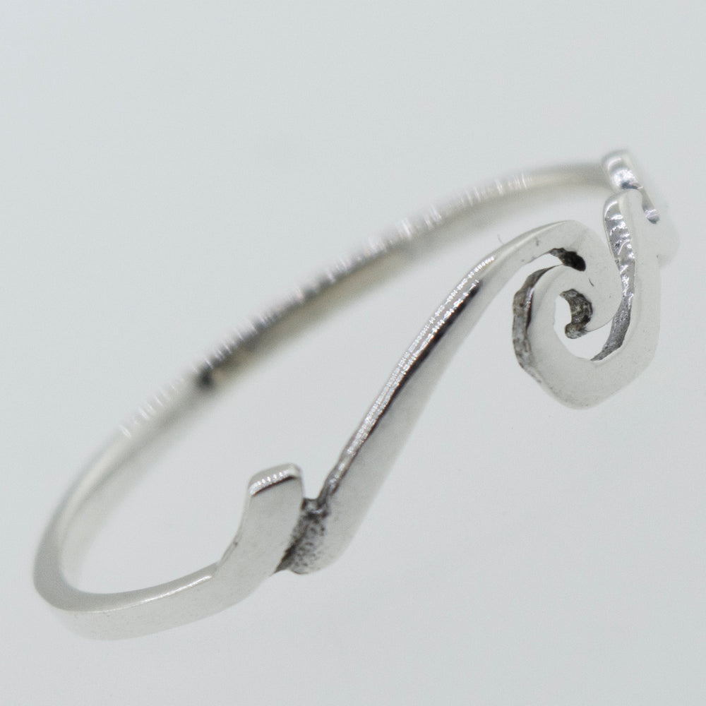 
                  
                    A minimalistic Wave Ring with a wave design, perfect for stacking and reminiscent of the coastal beauty of Santa Cruz.
                  
                