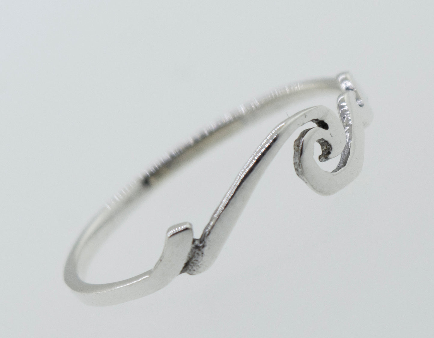 
                  
                    A minimalistic Wave Ring with a wave design, perfect for stacking and reminiscent of the coastal beauty of Santa Cruz.
                  
                