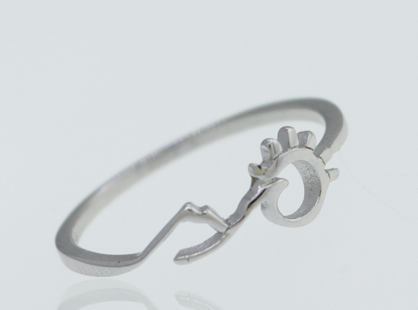 
                  
                    A Super Silver Mountain and Sun Ring with a heart on it.
                  
                
