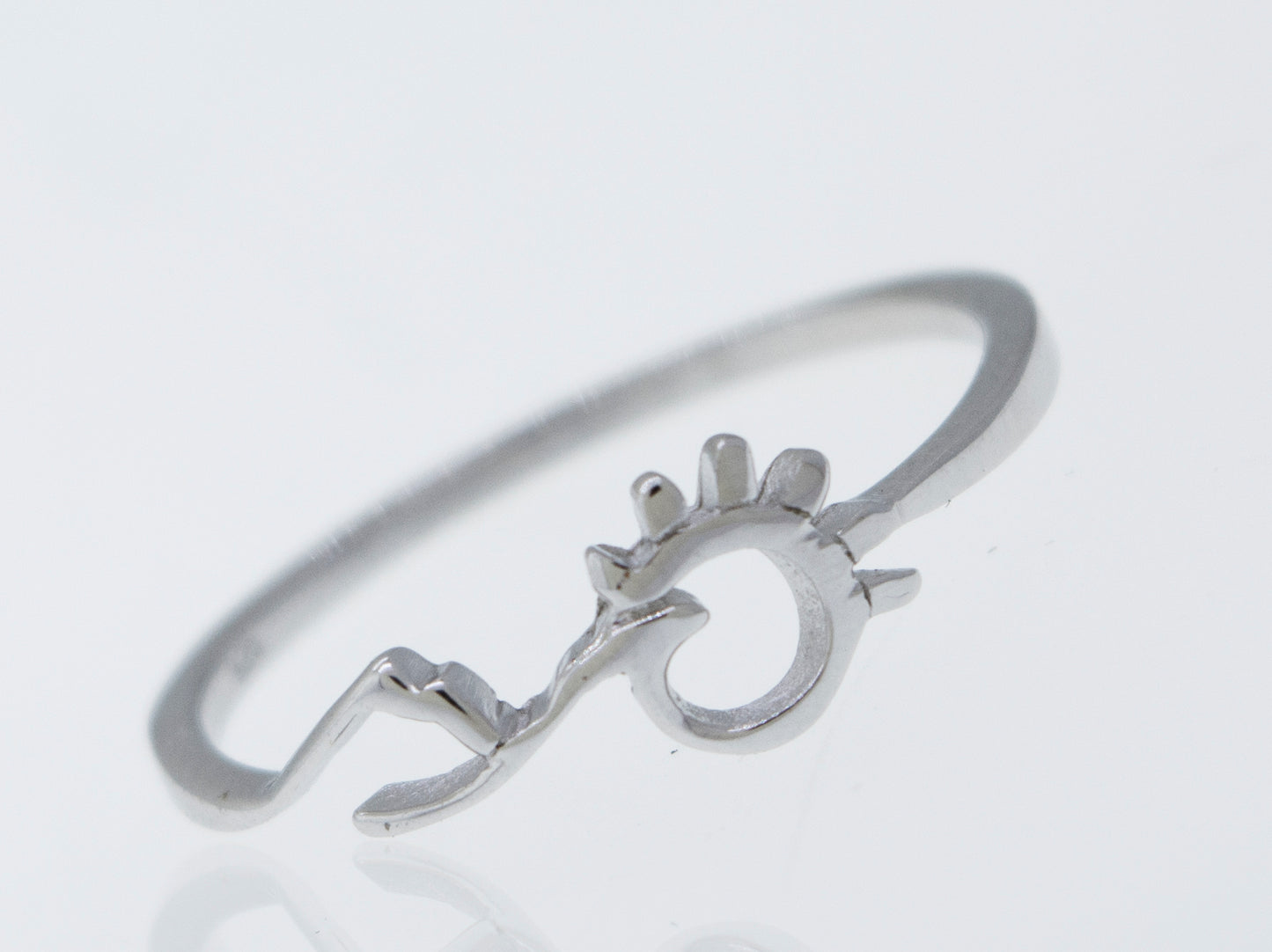 A Mountain and Sun Ring by Super Silver, a 925 sterling silver ring with an arrow on it.
