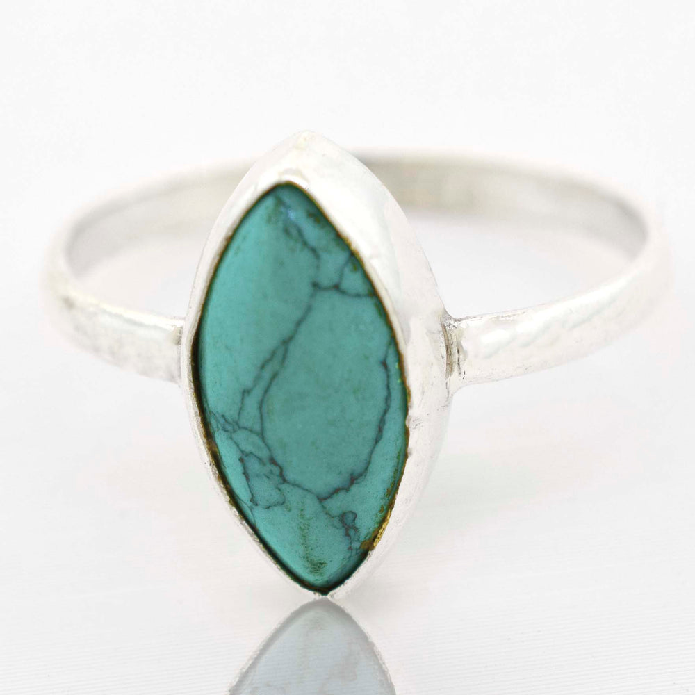 
                  
                    A Simple Marquise Shaped Gemstone Ring with a turquoise gemstone by Super Silver.
                  
                
