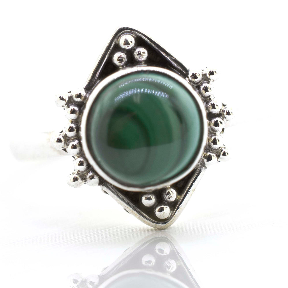 
                  
                    A Super Silver Round Gemstone Ring With Oxidized Diamond Shape Pattern with a green malachite gemstone.
                  
                