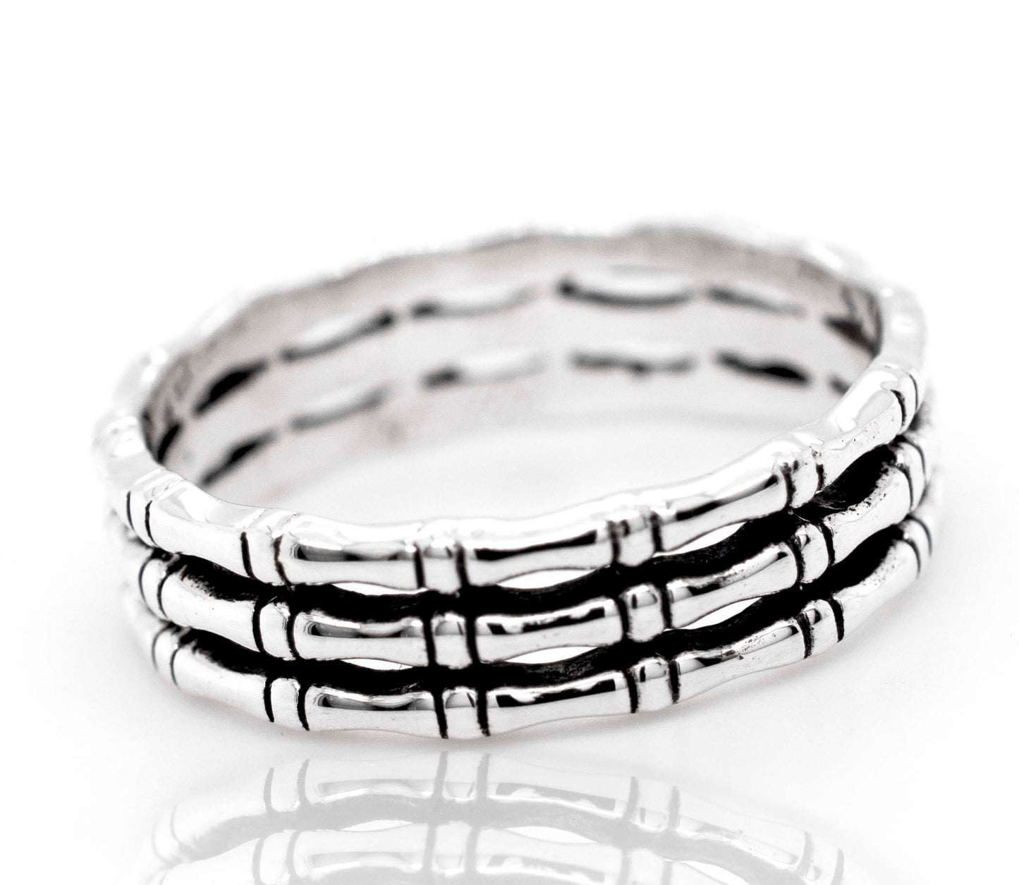 
                  
                    A minimalist style Super Silver Triple Bamboo Band Ring.
                  
                