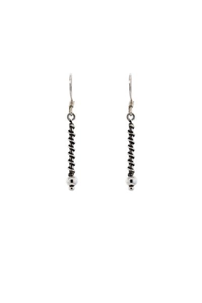
                  
                    Super Silver's Bali Coil Wrapped Drop Earrings with silver beads.
                  
                
