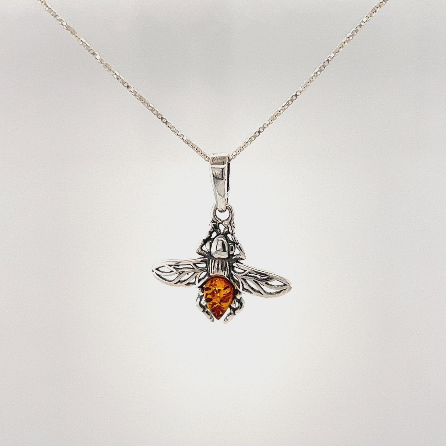 
                  
                    Load and play video in Gallery viewer, Delicate Amber Bee Pendant
                  
                