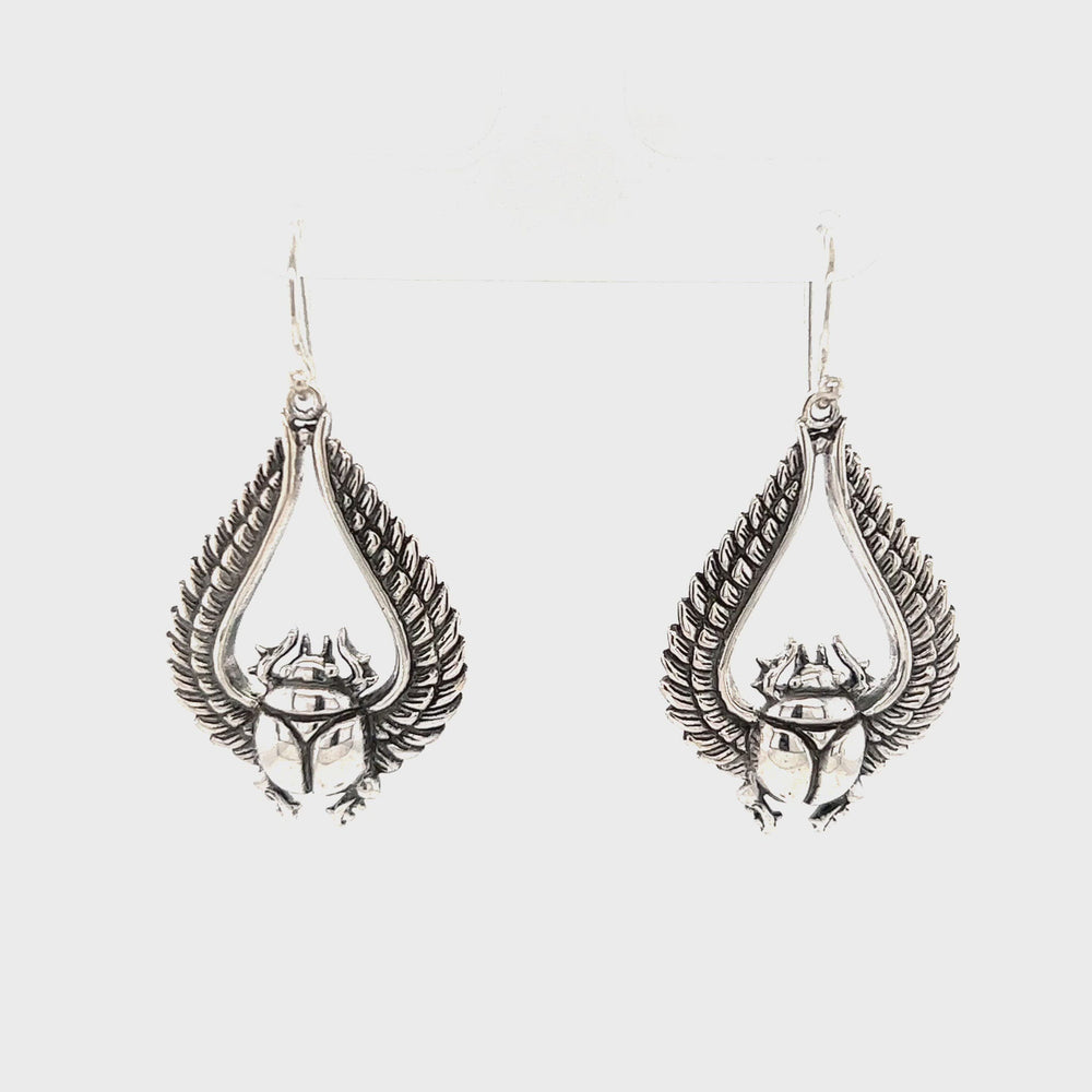 
                  
                    Load and play video in Gallery viewer, Winged Scarab Earrings
                  
                