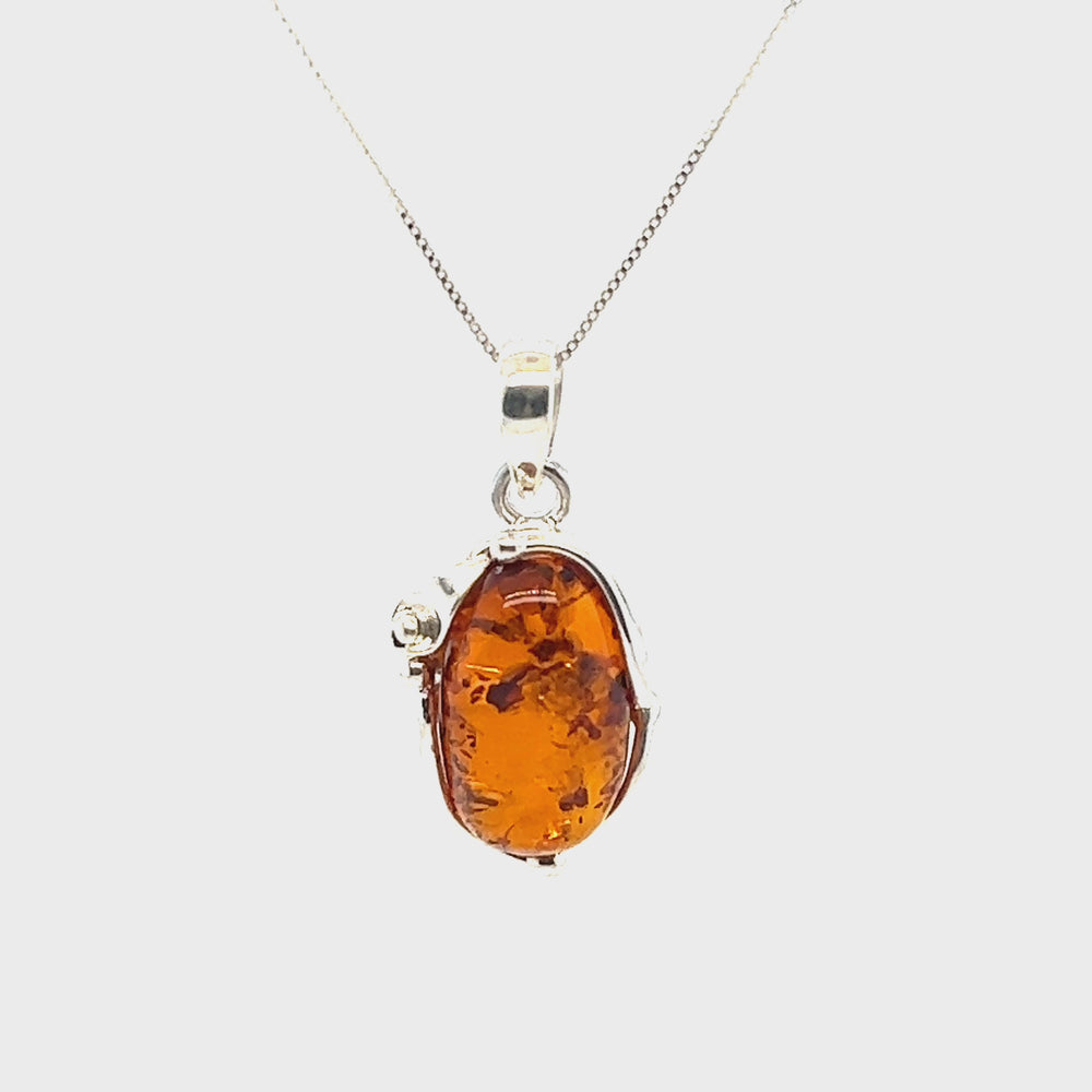 
                  
                    Load and play video in Gallery viewer, Stunning Amber Oval Pendant
                  
                