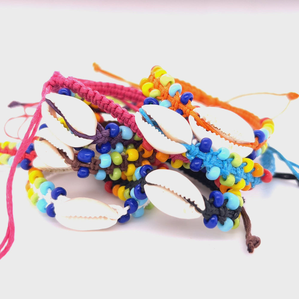 
                  
                    Load and play video in Gallery viewer, Cowrie Shell Braided Bracelet
                  
                