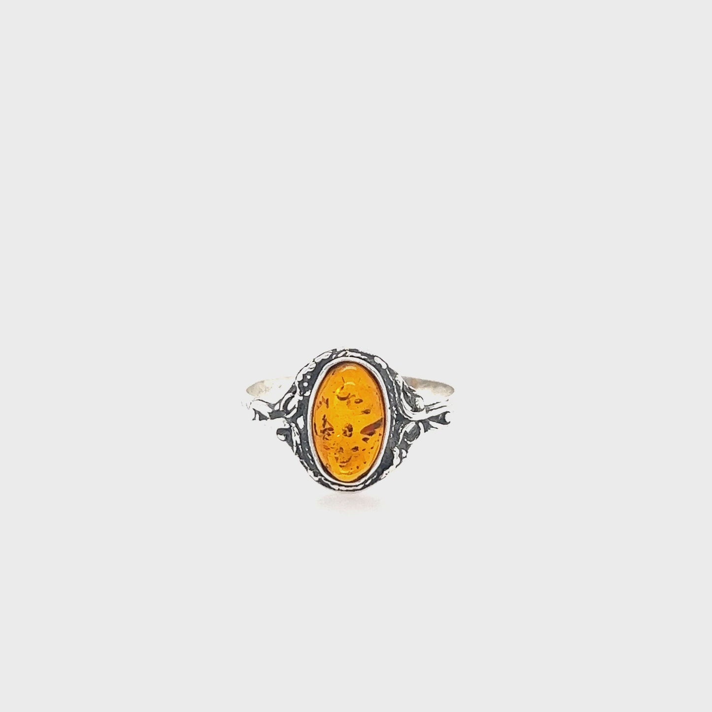 
                  
                    Load and play video in Gallery viewer, Delicate Baltic Amber Ring with Antique Setting
                  
                