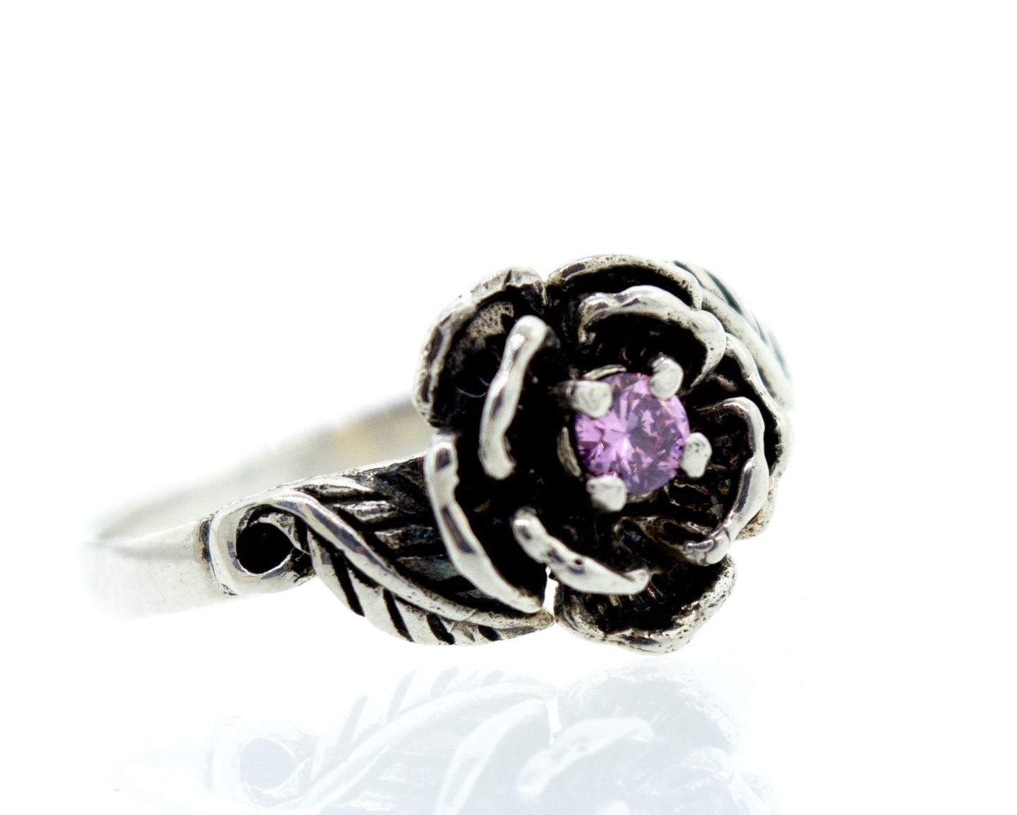 
                  
                    A vintage sterling silver Rose Ring With Pink CZ Stone adorned with delicate leaf detailing.
                  
                
