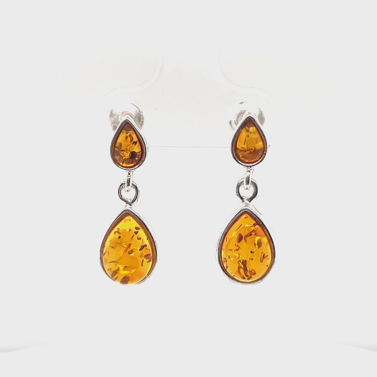 
                  
                    Load and play video in Gallery viewer, Double Teardrop Baltic Amber Earrings
                  
                