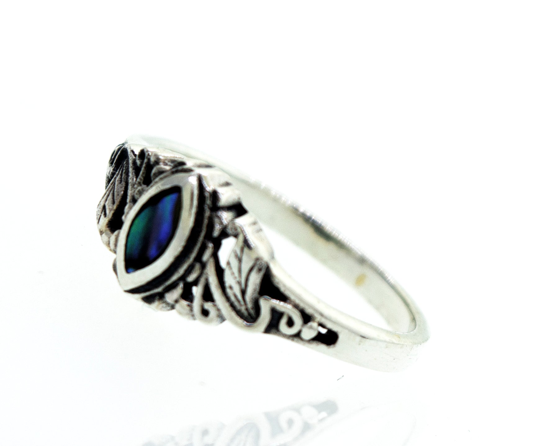 This Dainty and Intricate Abalone Ring by Super Silver features an exquisite abalone stone, showcasing a nature-inspired design.