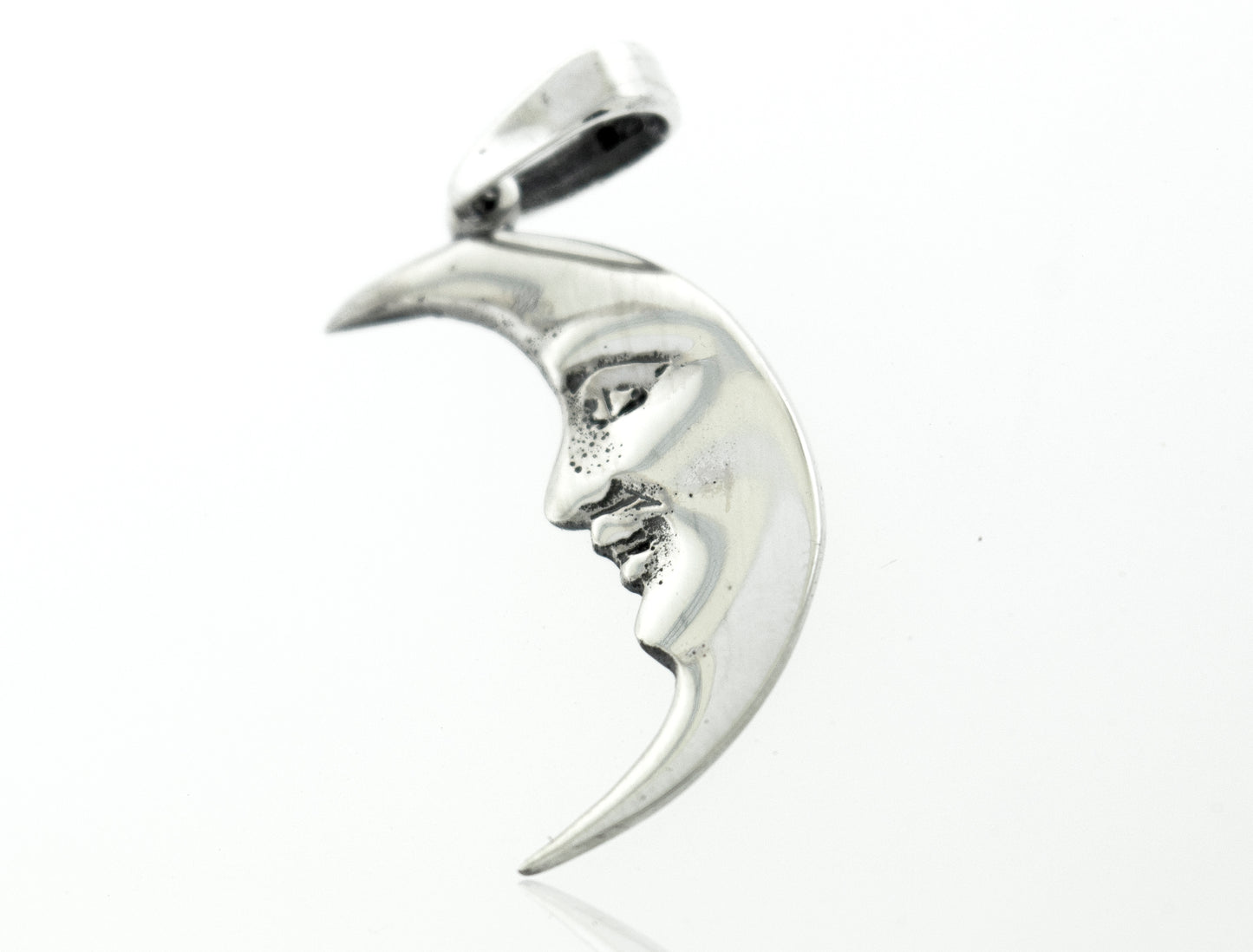 
                  
                    A Super Silver Crescent Man In The Moon Pendant with a graceful face engraved on it.
                  
                