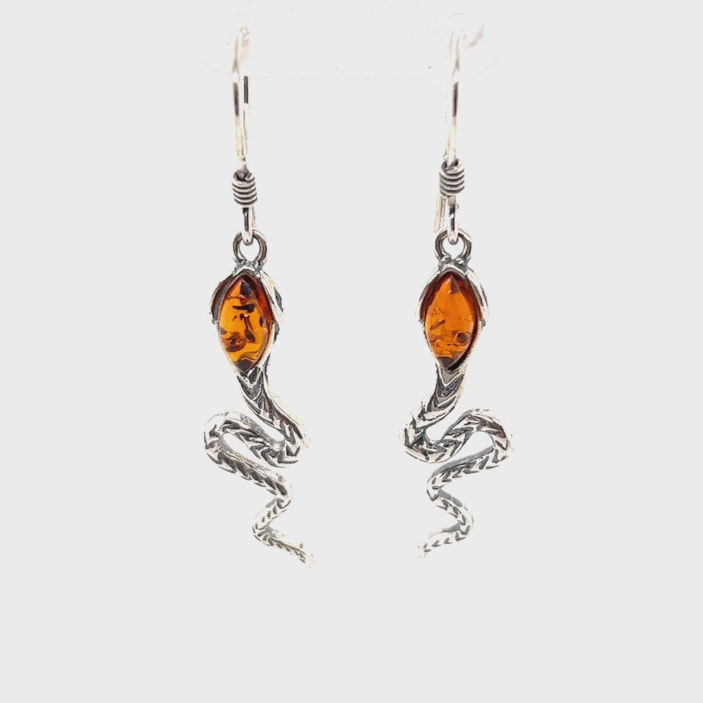 
                  
                    Load and play video in Gallery viewer, Alluring Amber Snake Earrings
                  
                