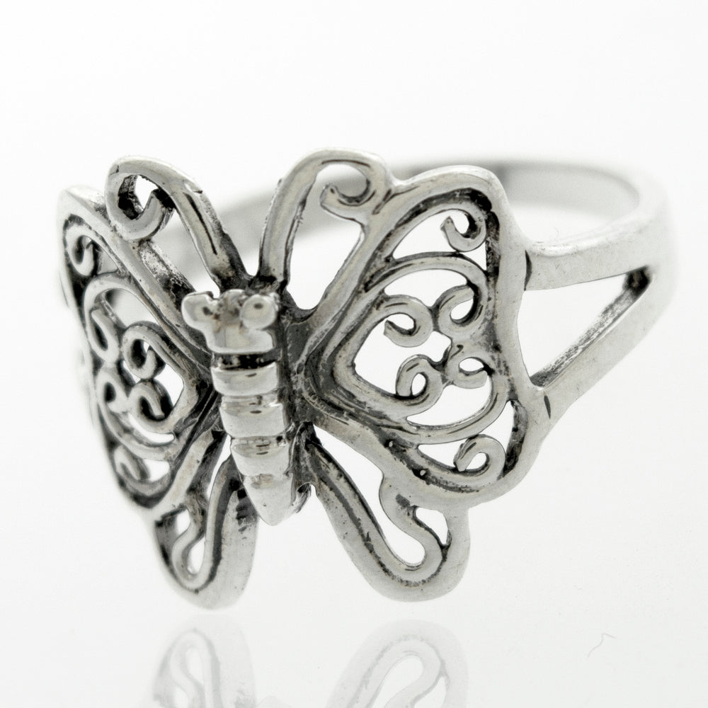 
                  
                    A minimalist sterling silver Butterfly Ring With Filigree Design.
                  
                