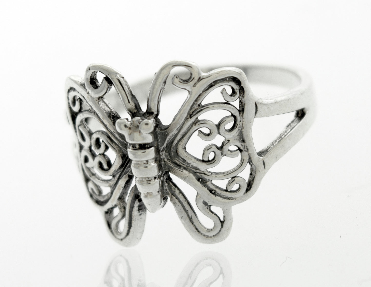 
                  
                    A minimalist sterling silver Butterfly Ring With Filigree Design.
                  
                