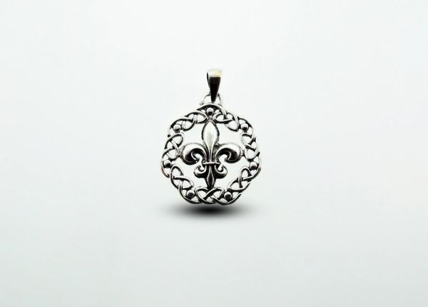 
                  
                    A Fleur De Lis pendant with an old-world charm would be the Super Silver Fleur De Lis Charm With Celtic Weave.
                  
                