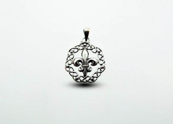 A Fleur De Lis pendant with an old-world charm would be the Super Silver Fleur De Lis Charm With Celtic Weave.