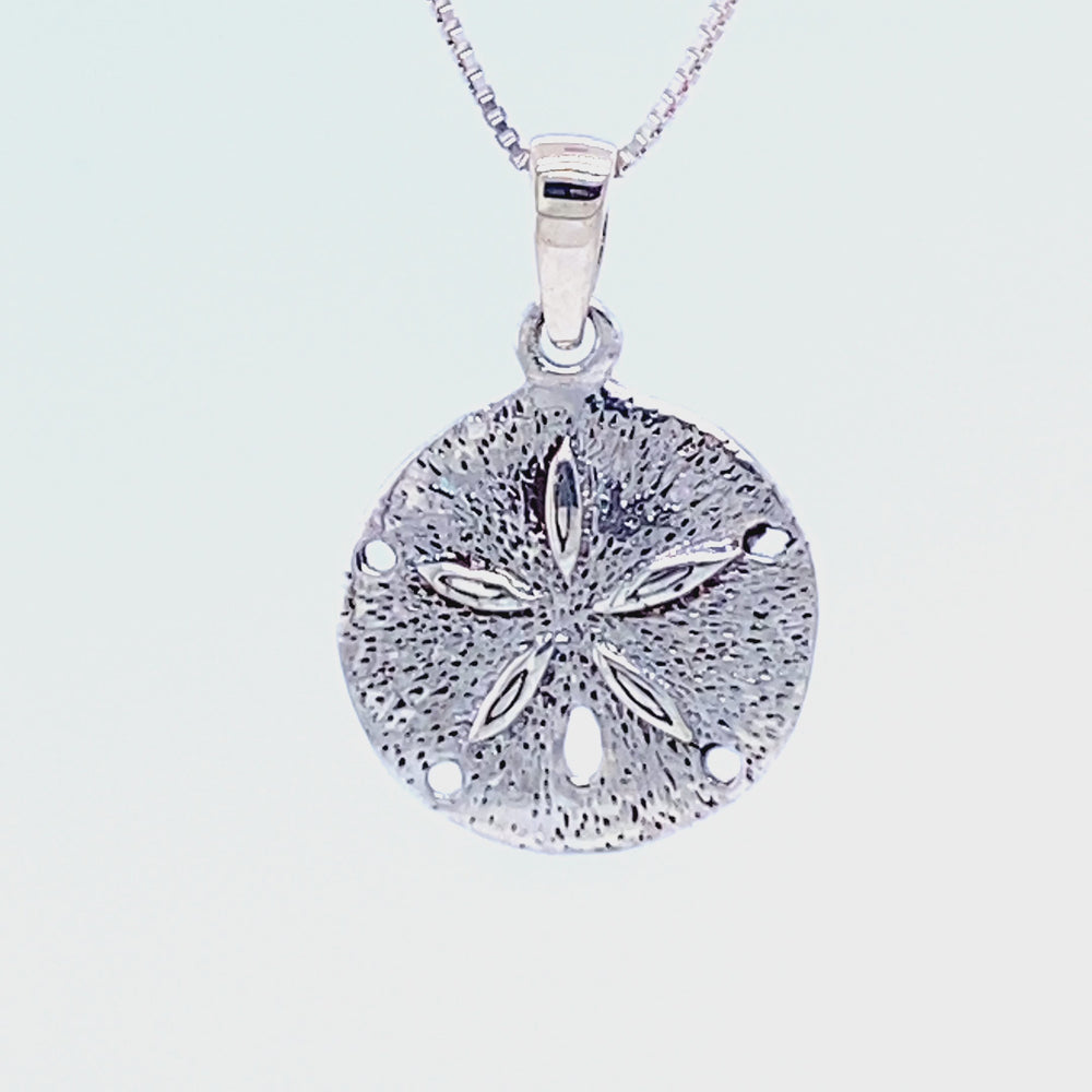 
                  
                    Load and play video in Gallery viewer, Small Sand Dollar Pendant
                  
                