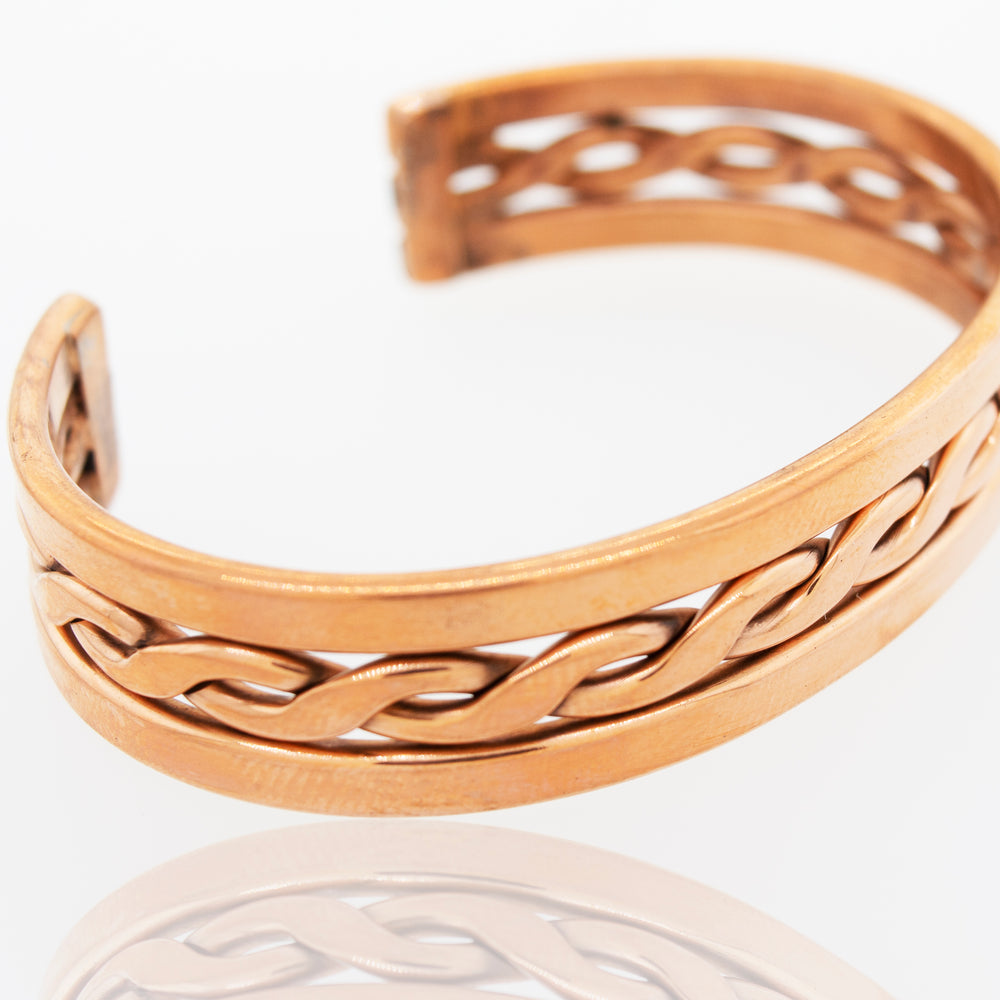 
                  
                    A Super Silver Native American Handmade Copper Bracelet with an intricate design.
                  
                