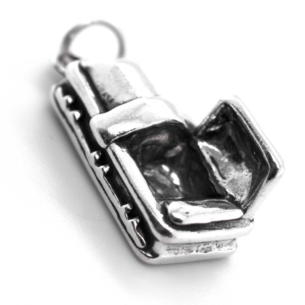 
                  
                    A Super Silver charm with an Open Coffin inside of it.
                  
                