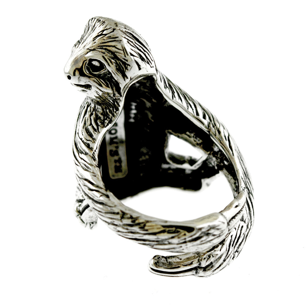 
                  
                    A Detailed Sloth Ring with a bird on it, designed by an artisan.
                  
                