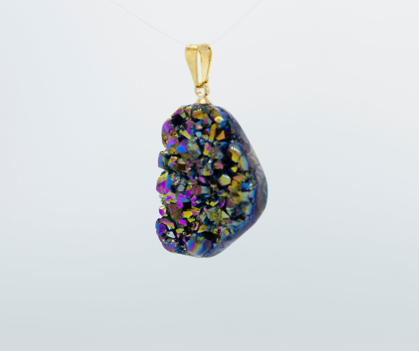 A magical Dazzling Druzy Pendant with a titanium druzy on it from Super Silver.