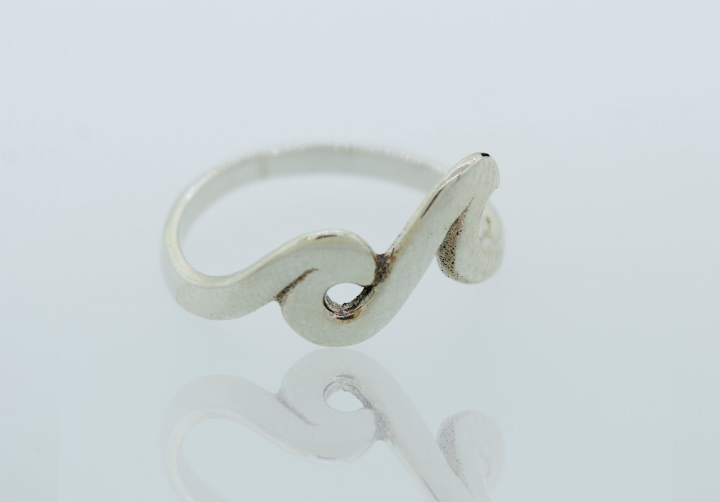 
                  
                    A sterling silver Two Waves Ring, perfect for minimalist styling.
                  
                