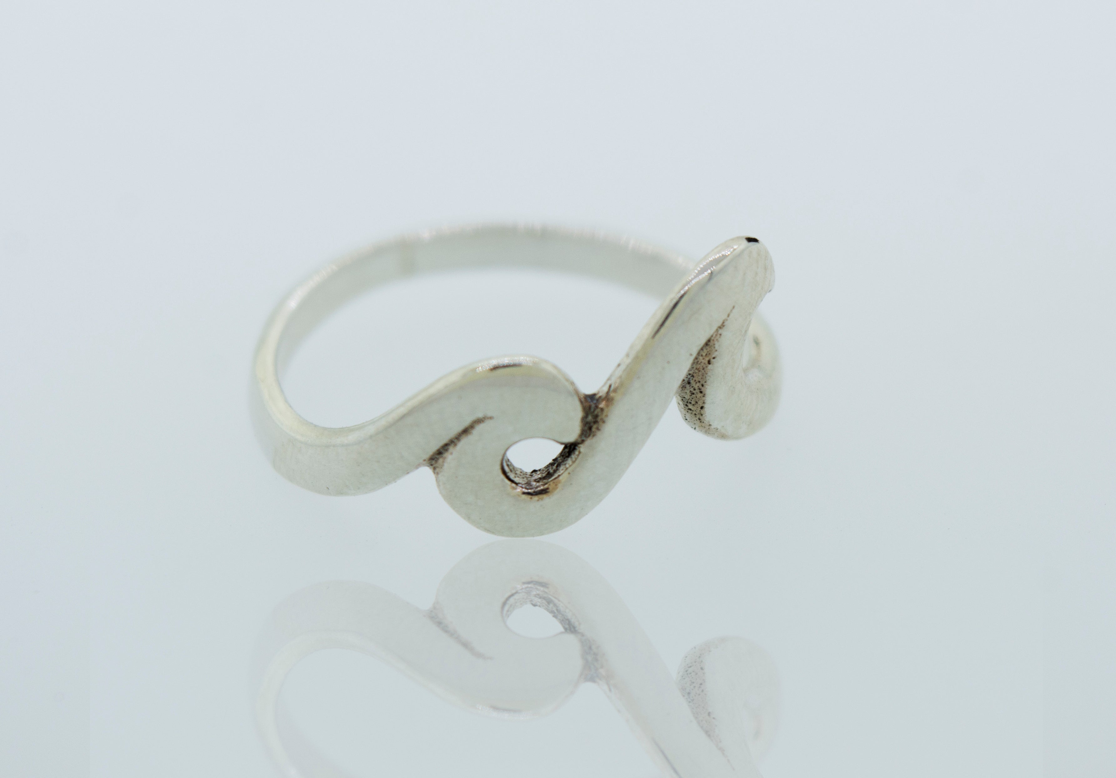 A sterling silver Two Waves Ring, perfect for minimalist styling.