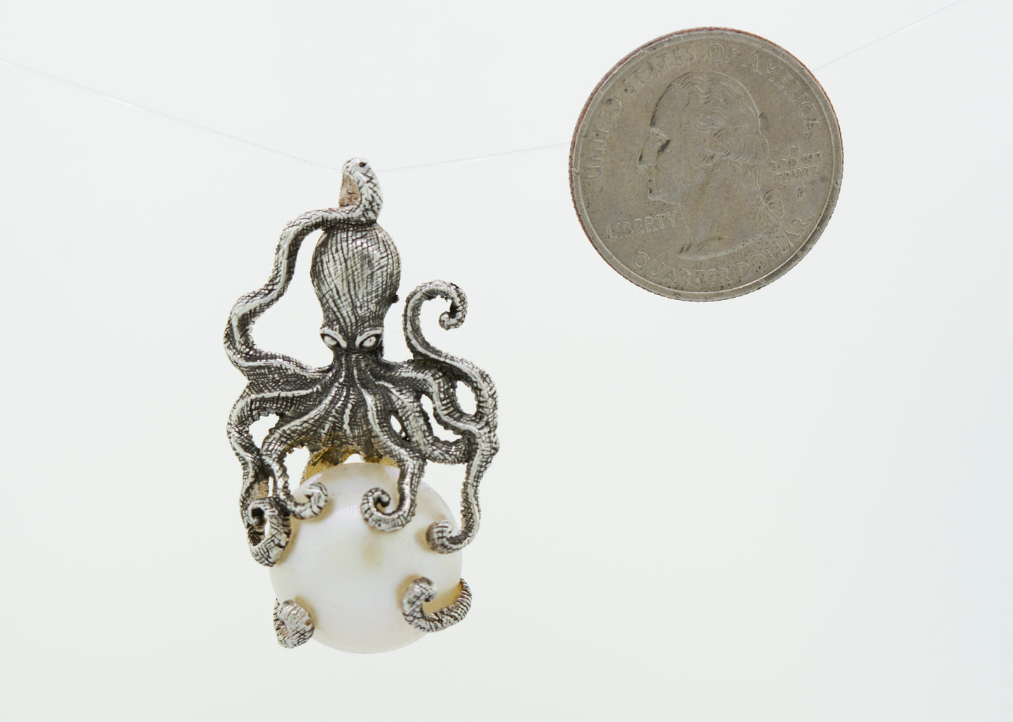 
                  
                    Octopus Pendant with Pearl
                  
                