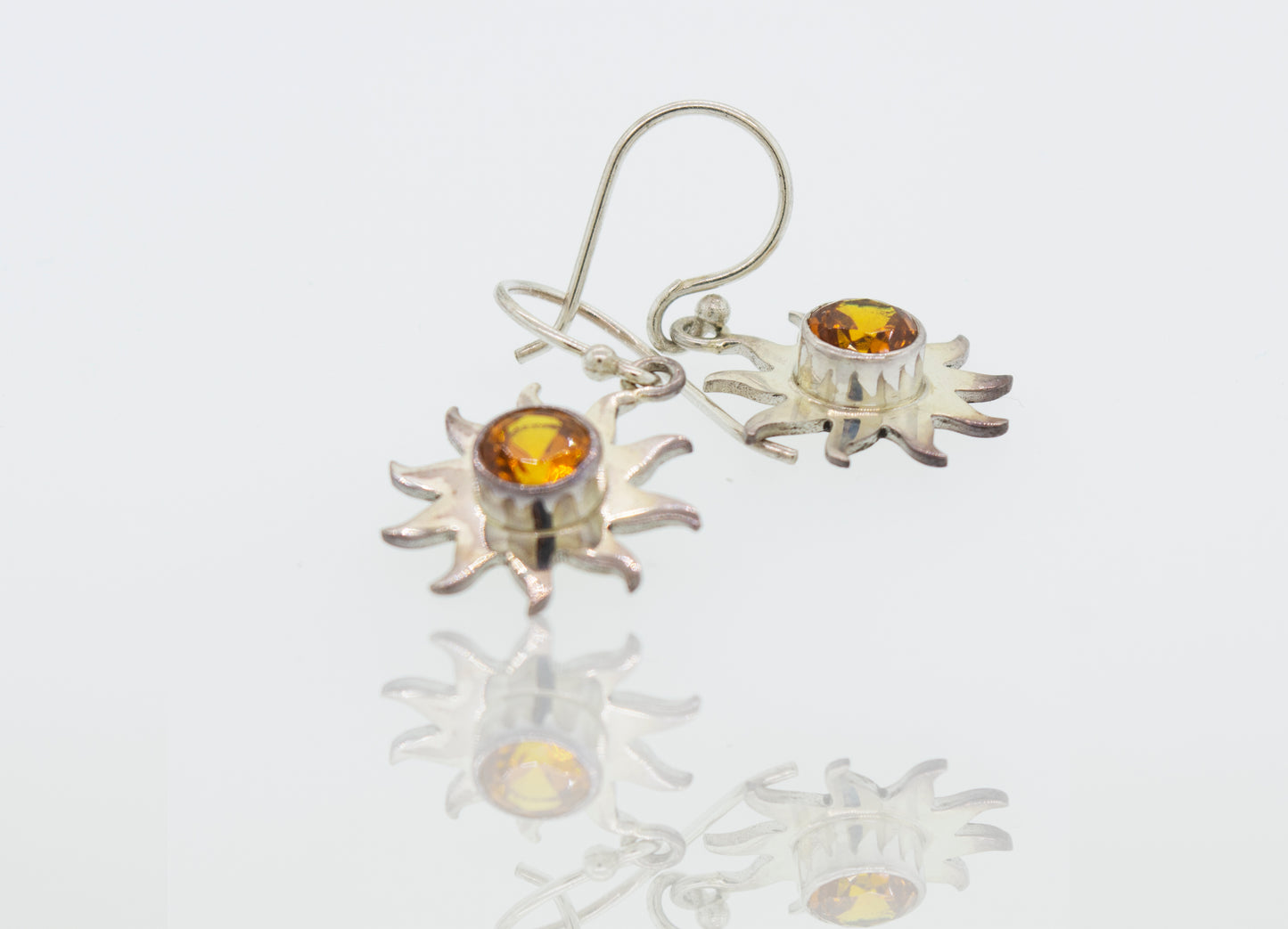 A radiant pair of Super Silver citrine sunburst earrings.