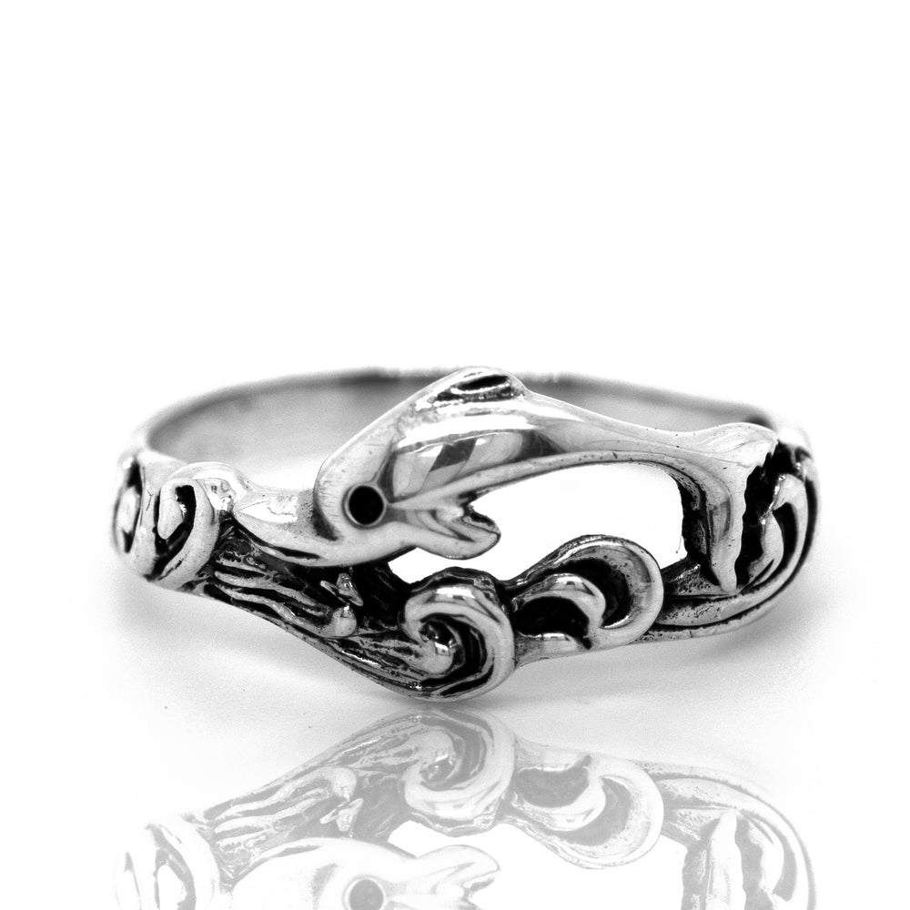 
                  
                    A Swimming Dolphin Ring by Super Silver, perfect for ocean lovers or those who adore Santa Cruz.
                  
                