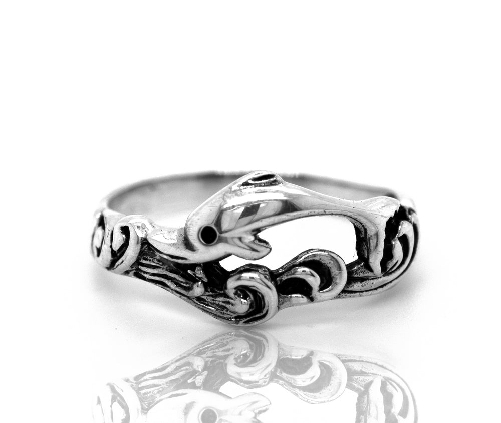 A Swimming Dolphin Ring by Super Silver, perfect for ocean lovers or those who adore Santa Cruz.