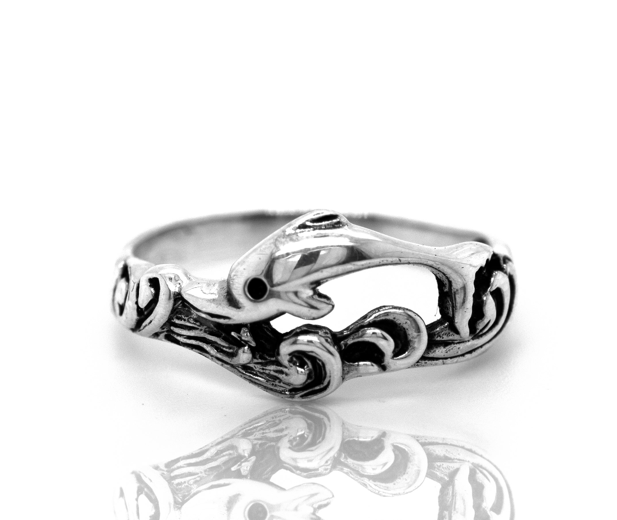 A Swimming Dolphin Ring by Super Silver, perfect for ocean lovers or those who adore Santa Cruz.