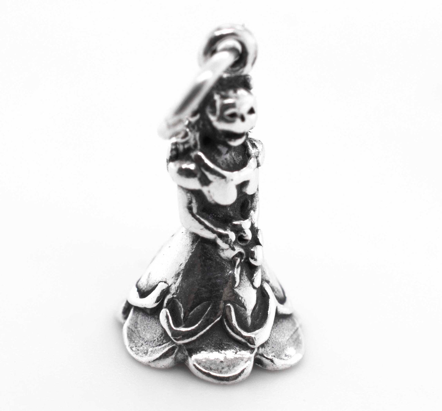 A haunting Skeleton Bride Charm with an image of a princess in a dress, by Super Silver.