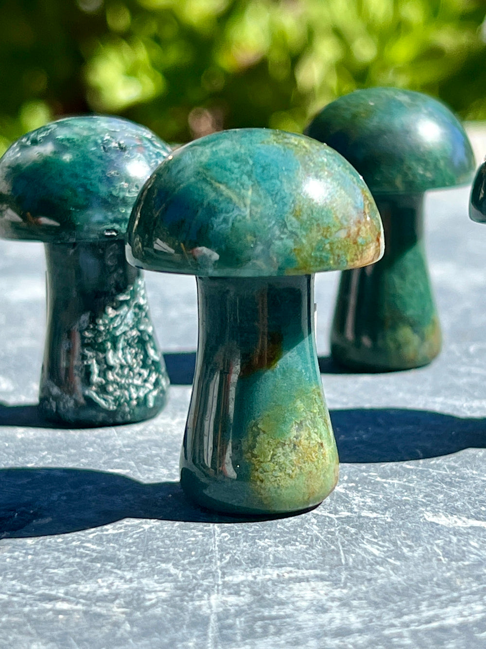 A group of Moss Agate Mushrooms adorning a cottagecore-inspired table decor.