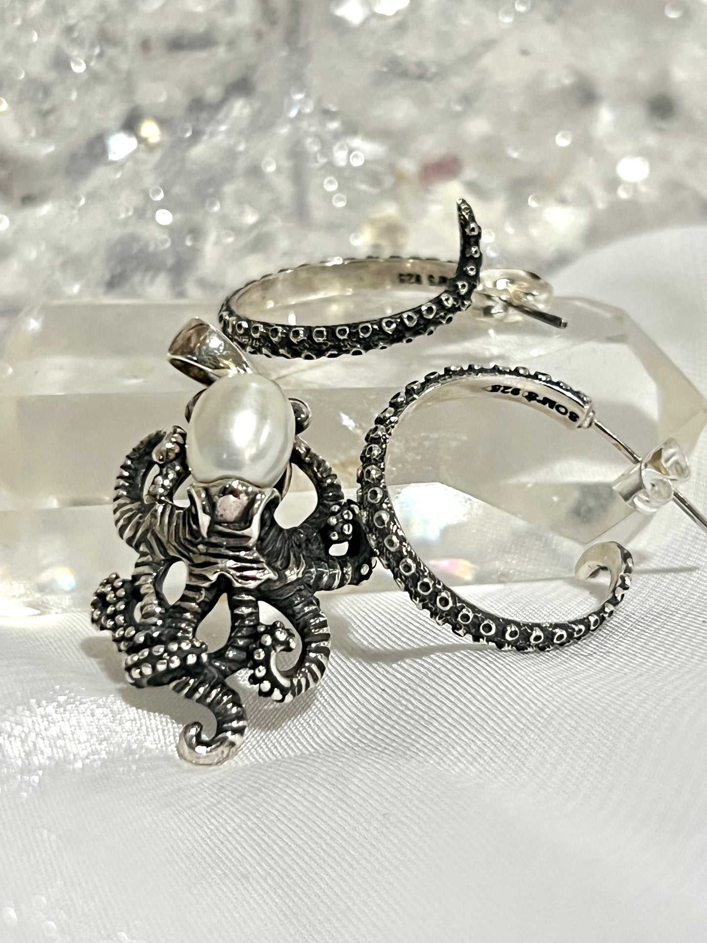 Super Silver's Handcrafted Octopus Tentacle Hoops with an oxidized finish, handmade in sterling silver.