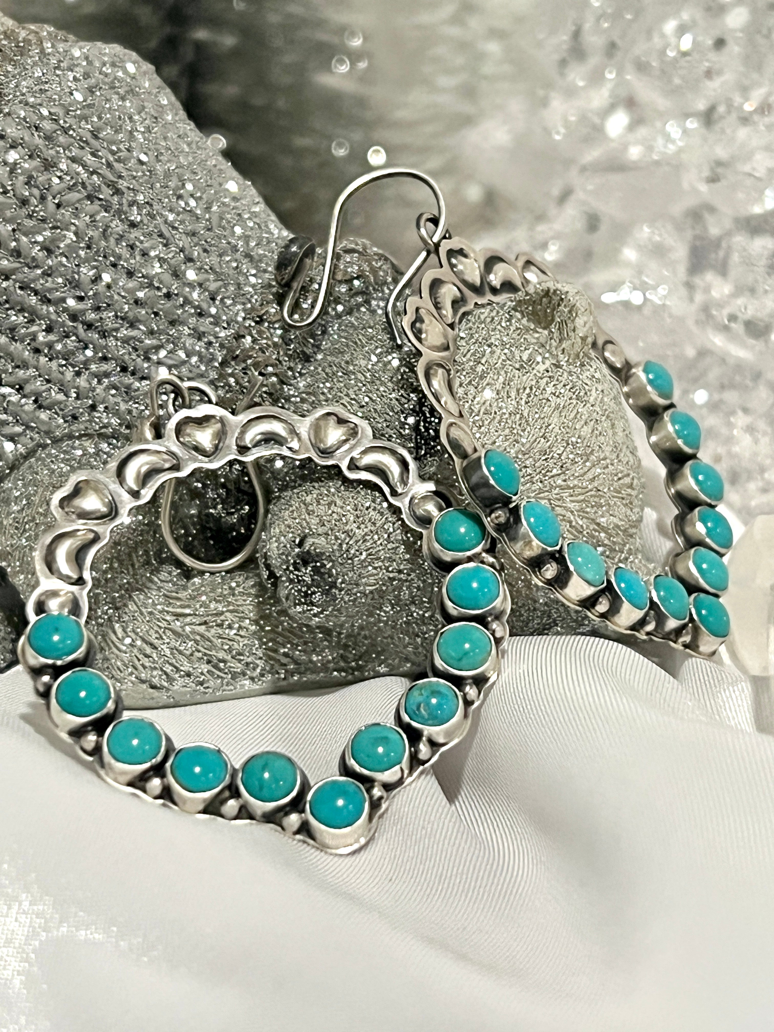 Super Silver's Statement Handmade Turquoise Earrings with a touch of southwestern elegance and silver hoops.
